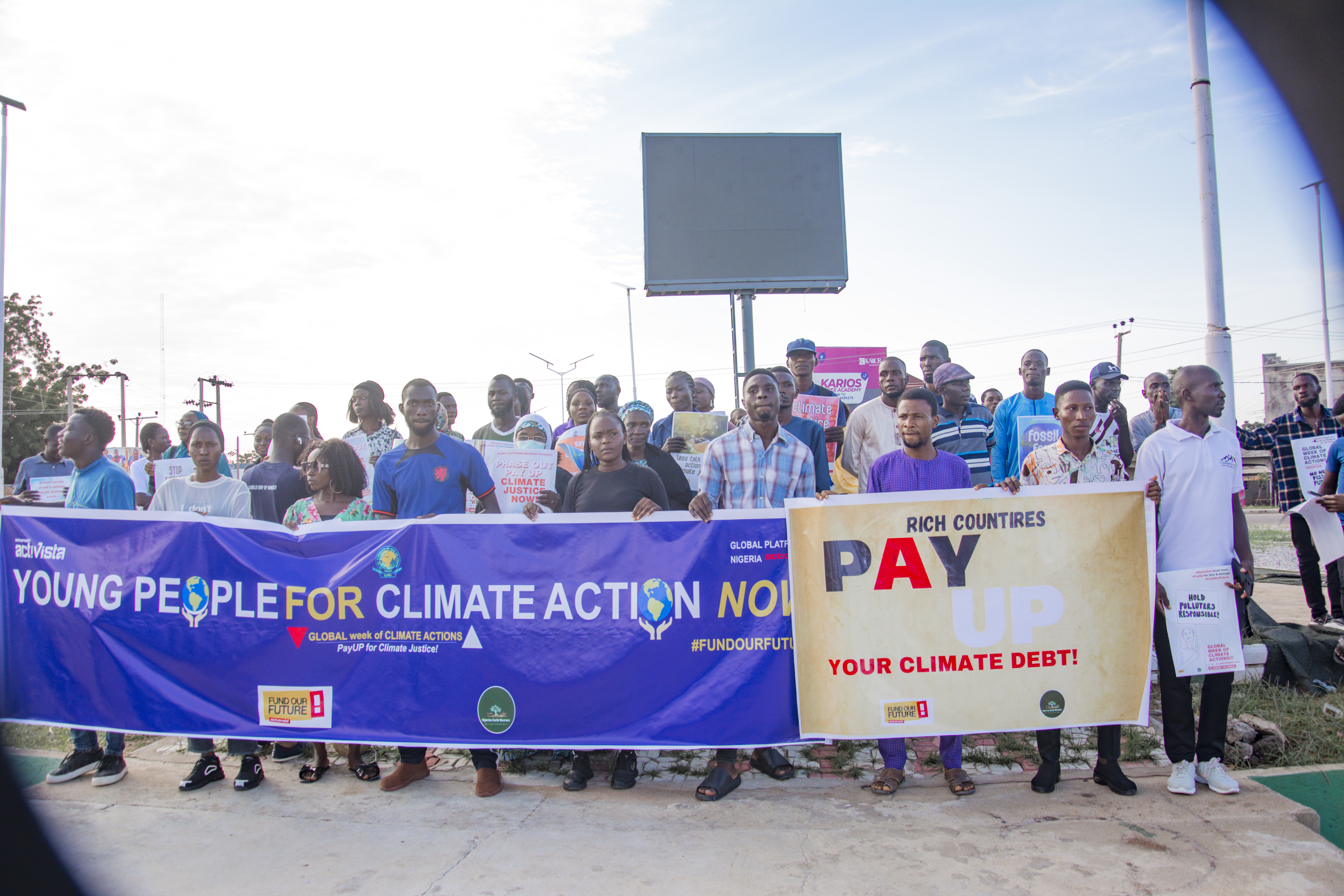 Participants with Global Week of Climate Actions flyer